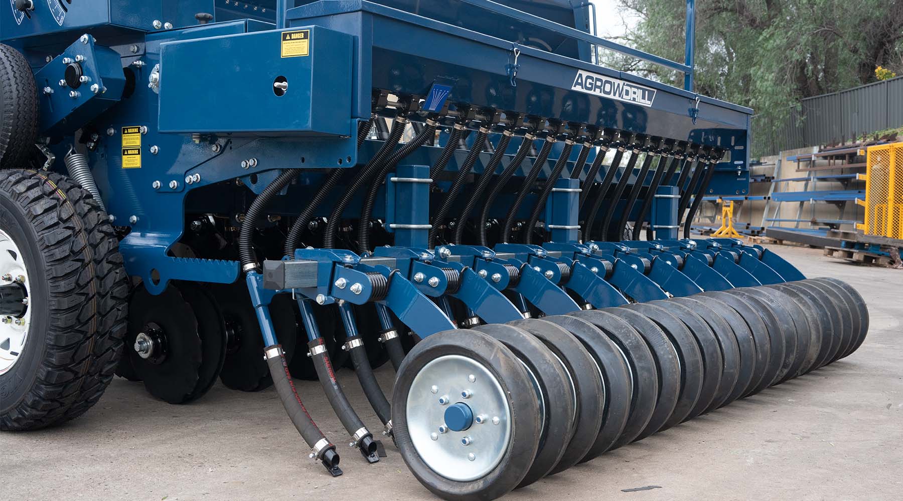 Small seed box downtubes with presswheels on AD140 seed drill