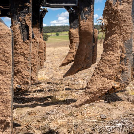 Compacted soil on deep ripper shanks
