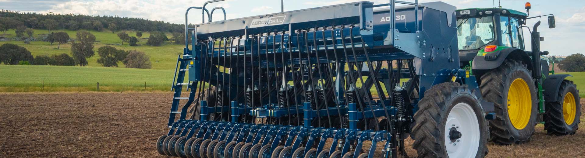 AD730 seed drill with rolling hills and paddock