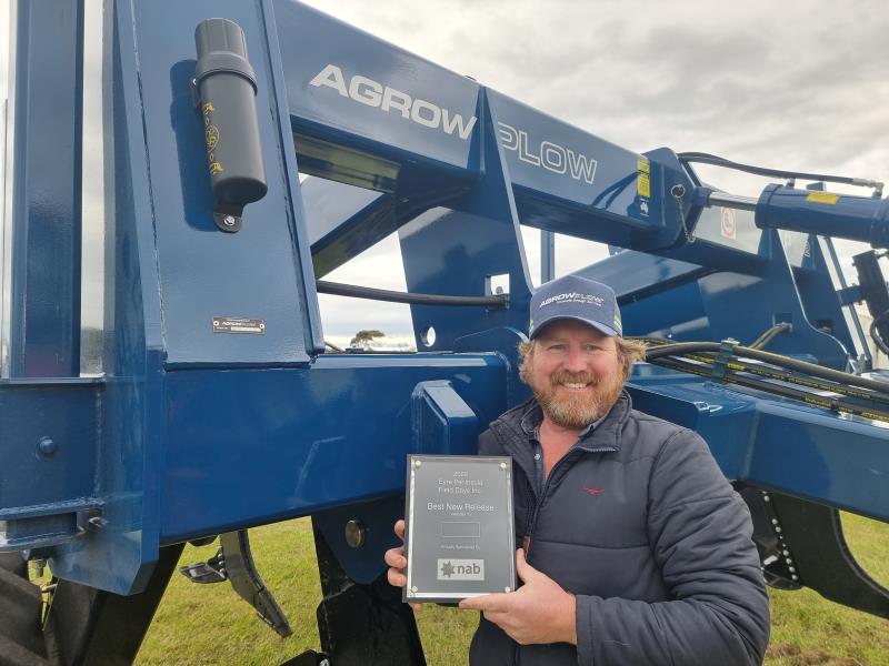 Agrowplow Salesman Dean Symons with Field Day Award and AP102