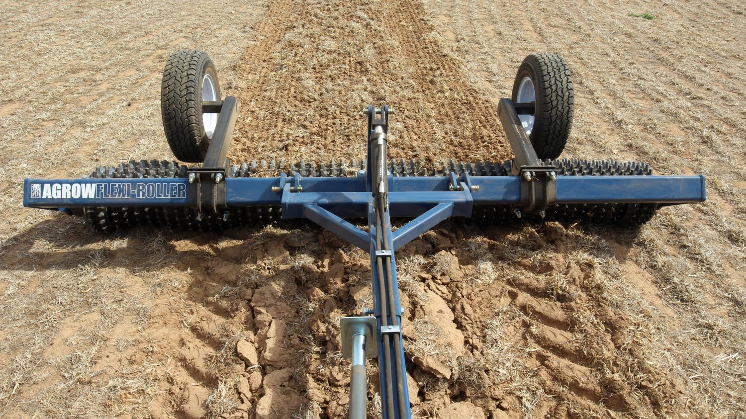 A flexi-roller smoothing the soil behind a deep ripper