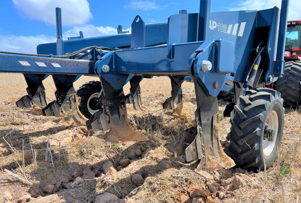 AP102 with shanks raised out of the ground in rocky terrain
