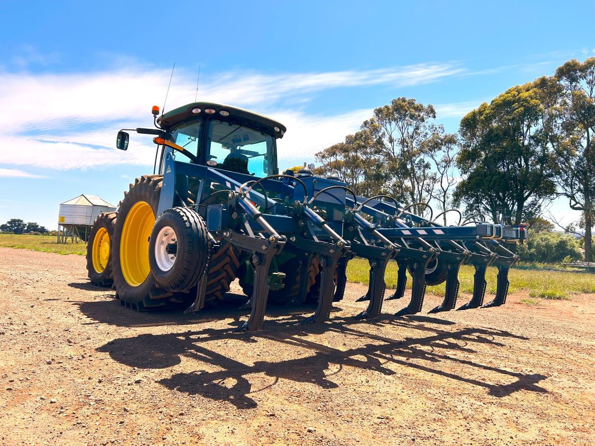 Agrowplow AP52 hydraulic plough using the three point linkage connection of a John Deere tractor