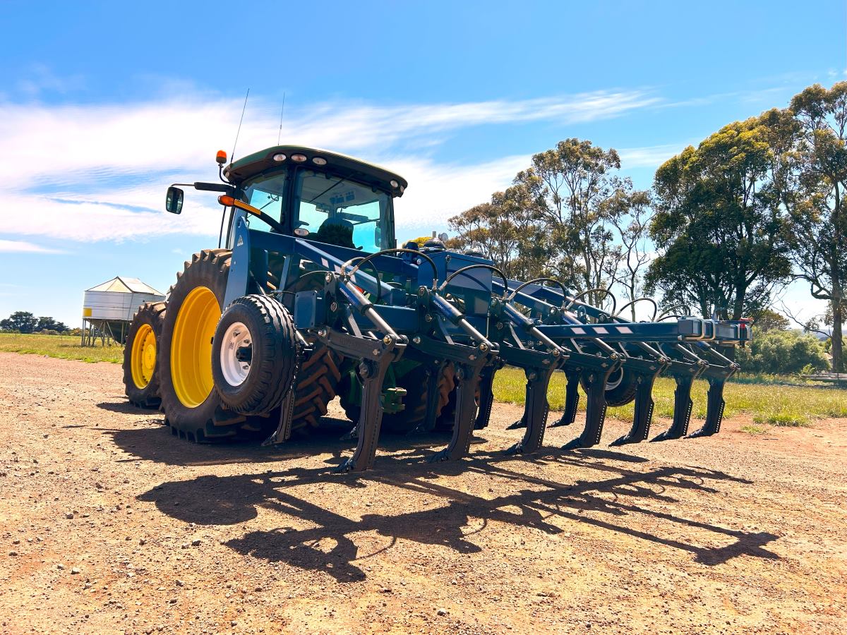 Agrowplow AP52 hydraulic plough using the three point linkage connection of a John Deere tractor