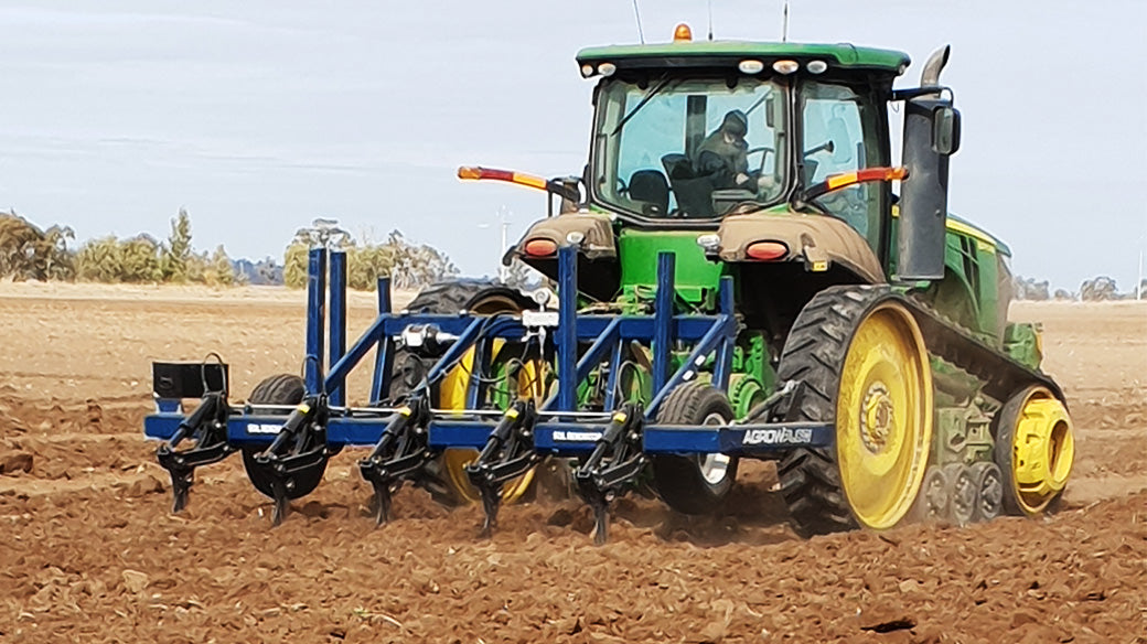 Agrowplow AP51 deep tillage plough on tracked tractor