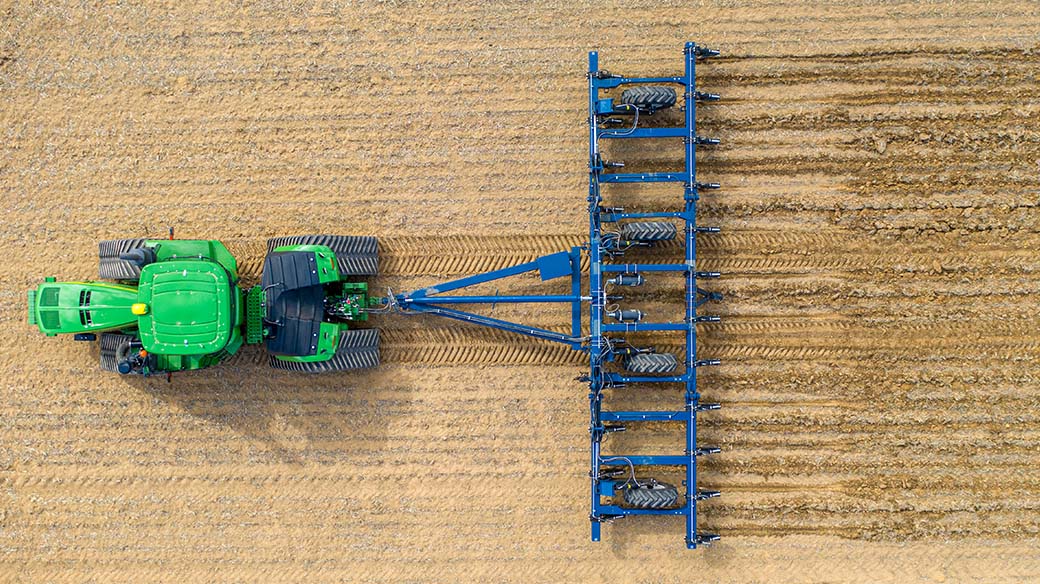 Aerial view of he AP81 Agrowplow behind John Deere tractor